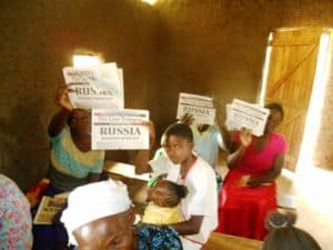 Kenyans show off copies of "The Last Trumpet"